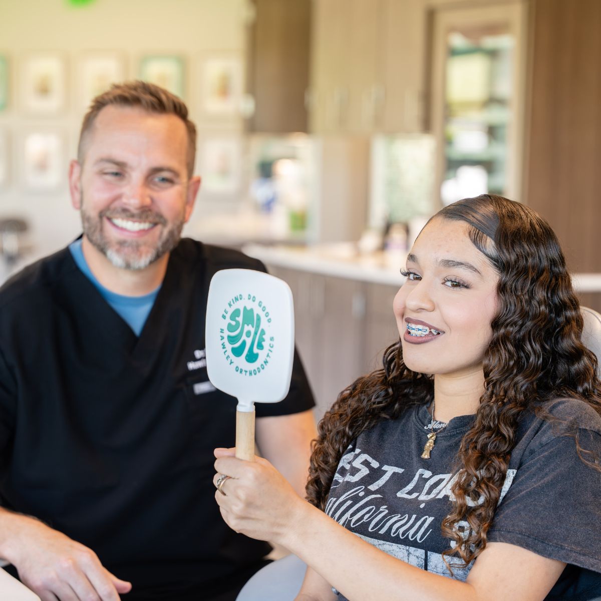 Hawley Orthodontics patient smiling